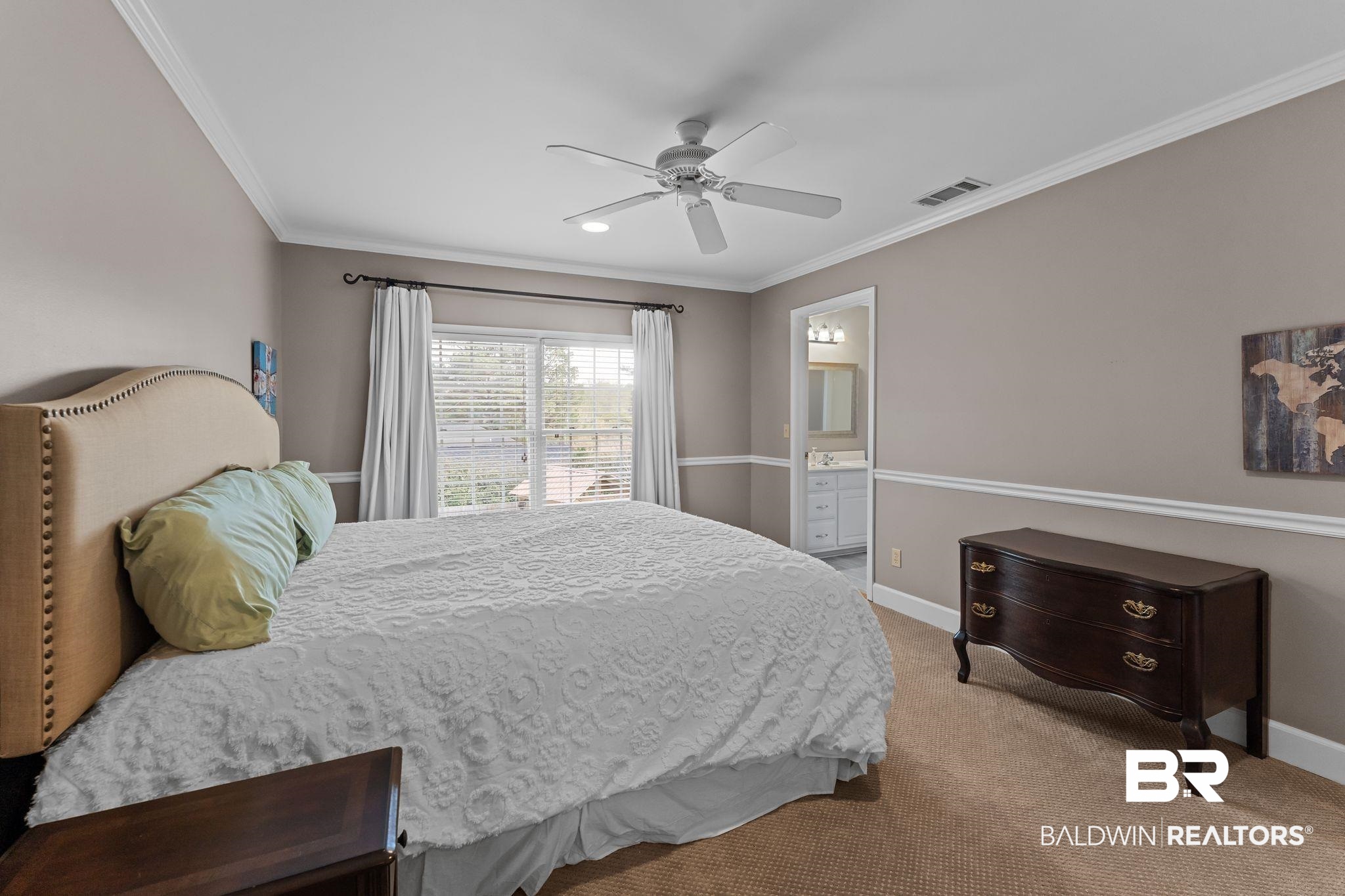 525 Norwood Road Monroeville, AL 36460 - Photo 34 of 55 Carpeted bedroom with crown molding, ceiling fan, and ensuite bathroom