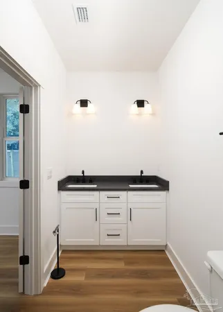 a view of a livingroom with wooden floor