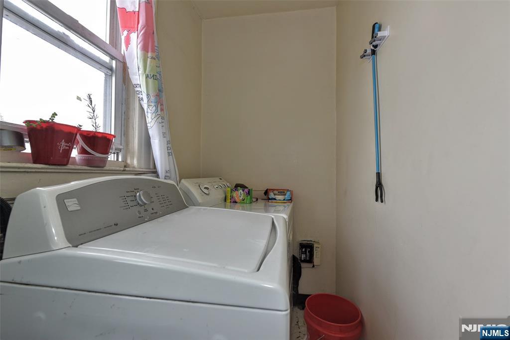 423 North 8th Street Fairview, NJ 07022 - Photo 23 of 30 a bathroom with a toilet and sink