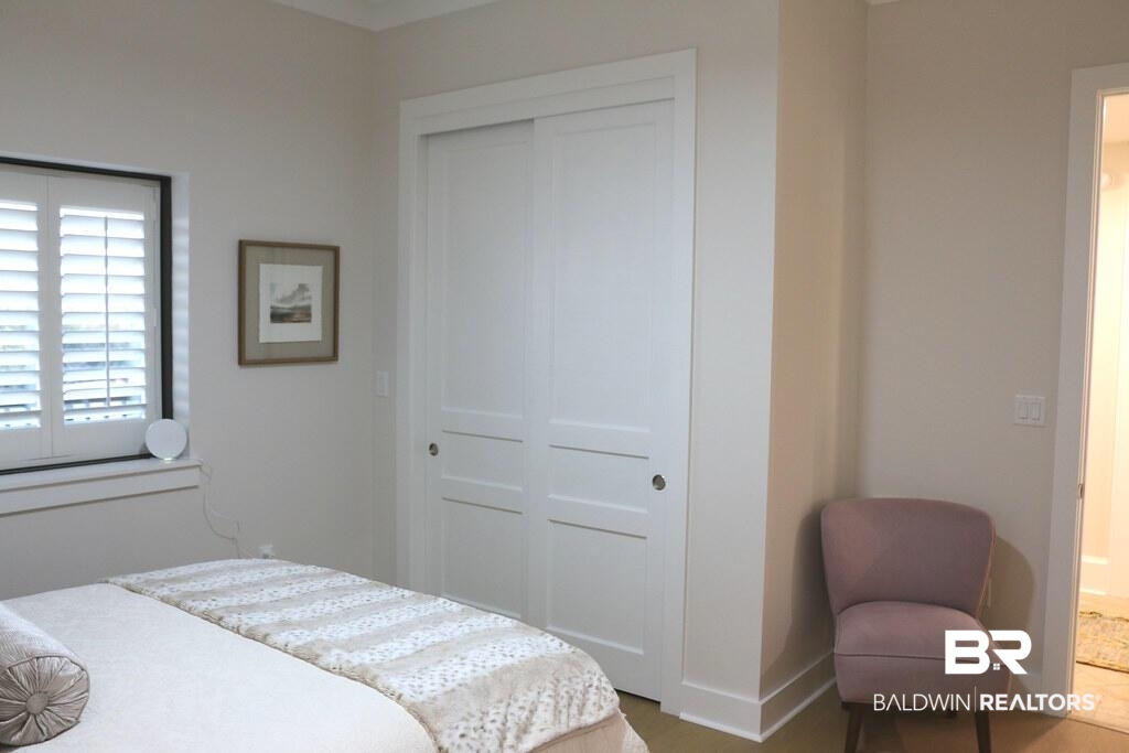 18269 Colony Drive, Unit 803 Fairhope, AL 36532 - Photo 20 of 27 Bedroom featuring a closet and baseboards