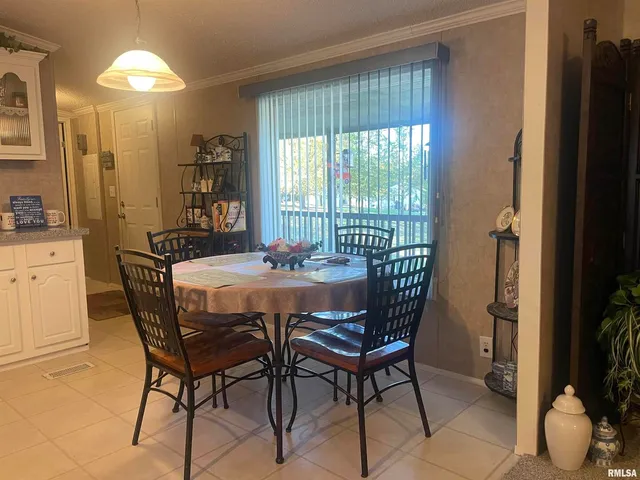 a bedroom with a bed and a cabinets