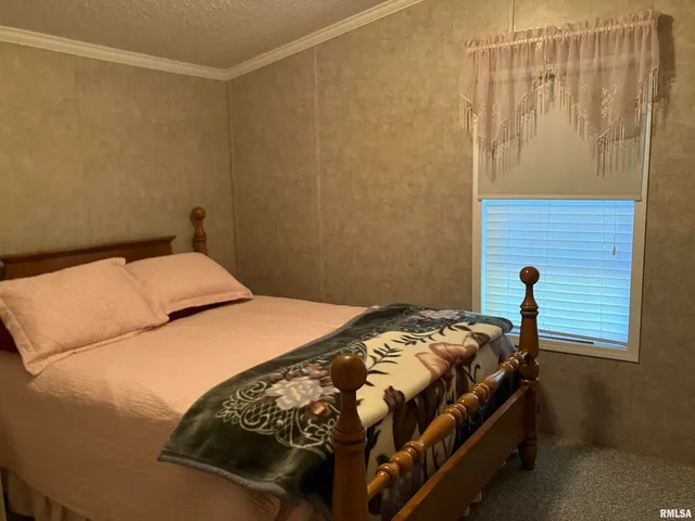 a view of a balcony with wooden floor