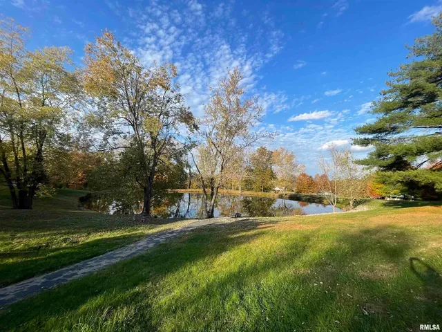 a view of a lake from a yard