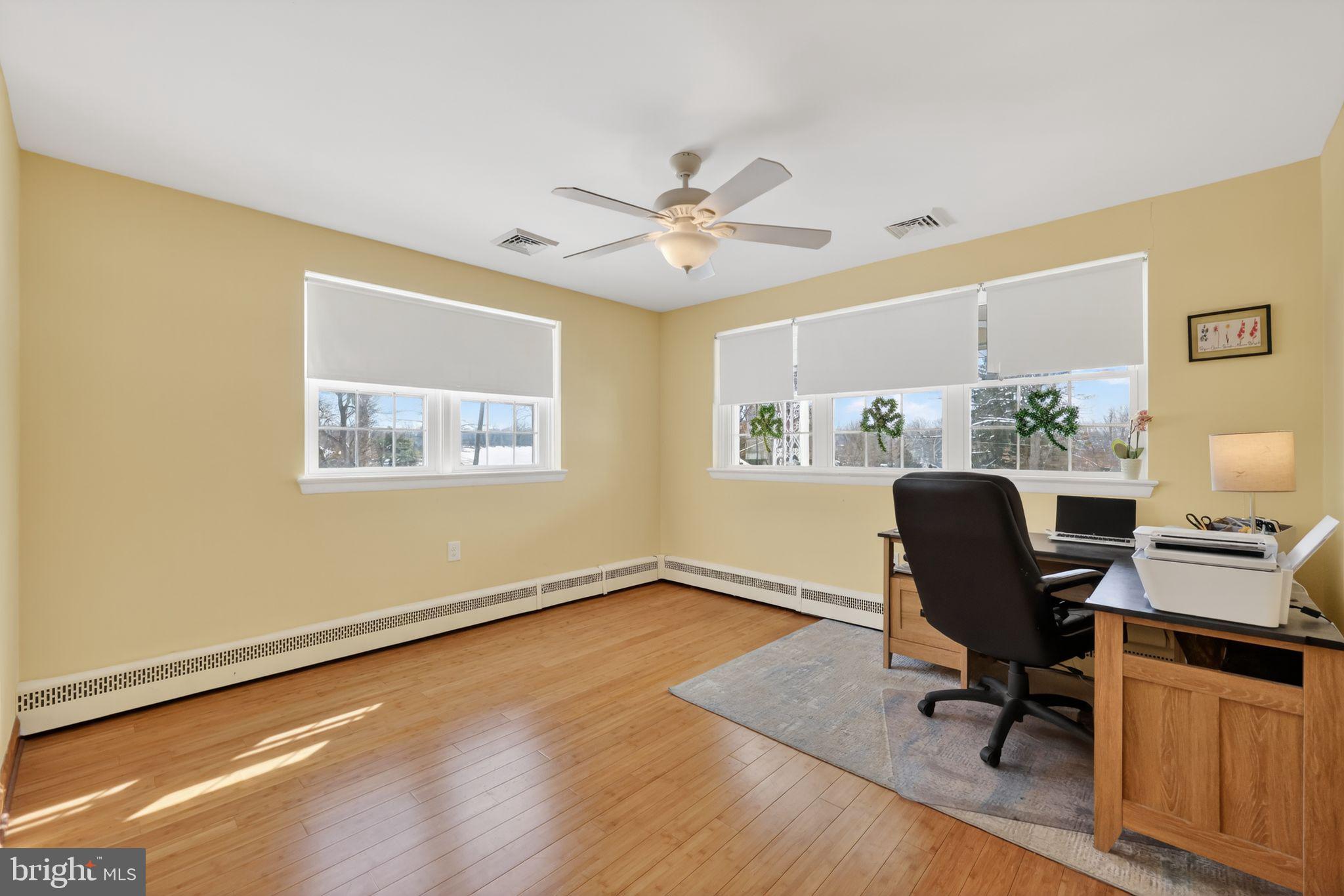 3206 Manor Road Huntingdon Valley, PA 19006 - Photo 25 of 37 a view of a workspace with furniture and a window