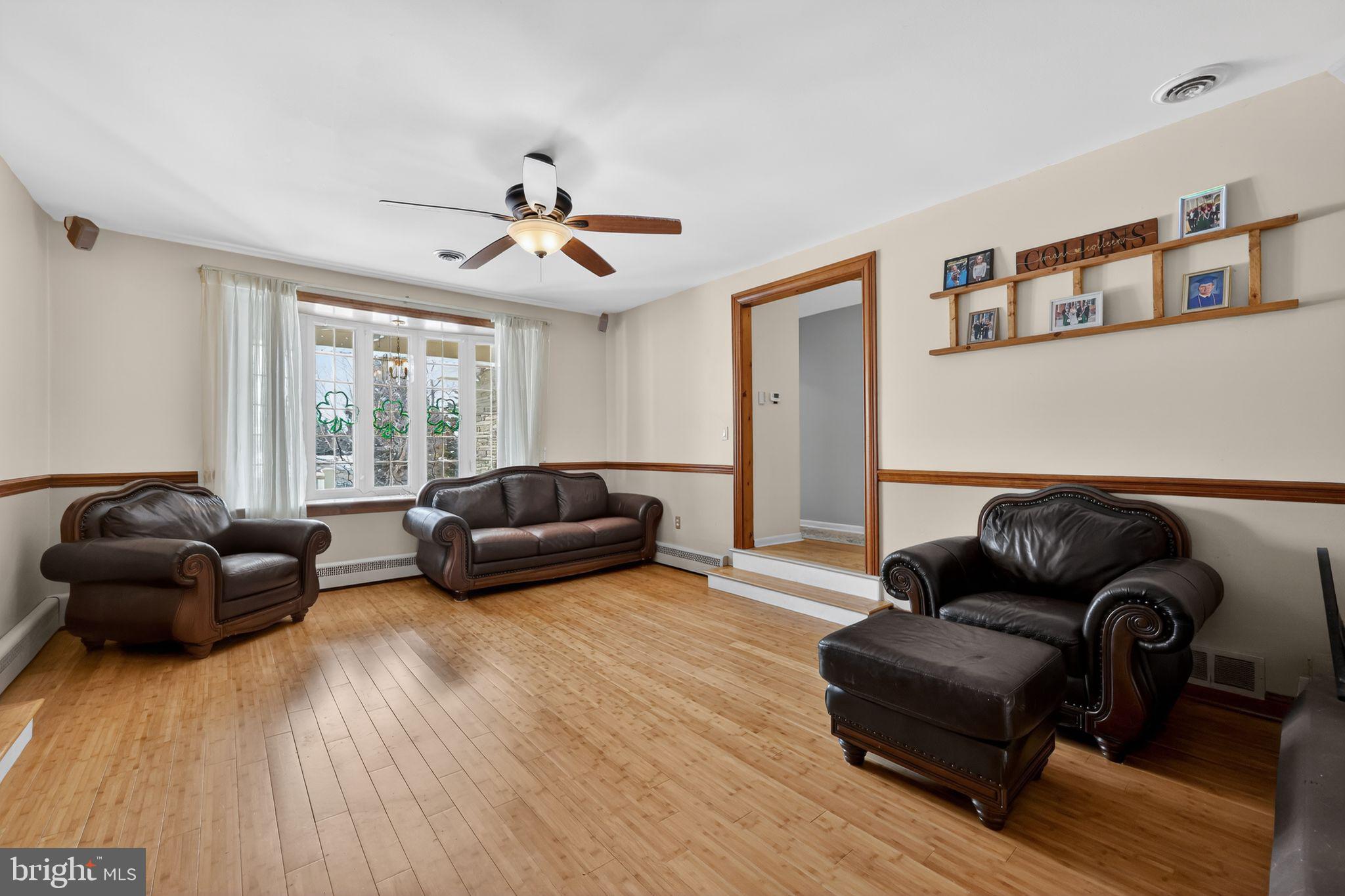 3206 Manor Road Huntingdon Valley, PA 19006 - Photo 7 of 37 a living room with furniture and a window