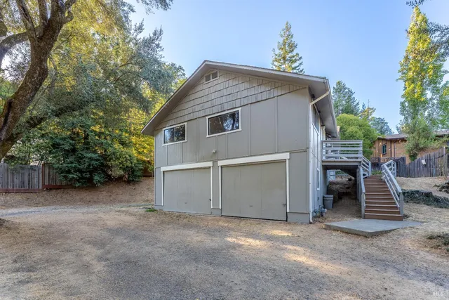 a view of a house with a garage