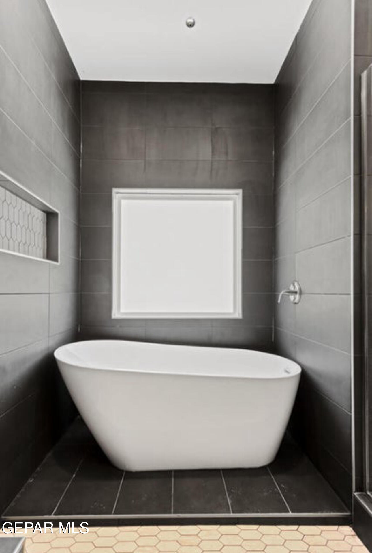 6044 Fall Ridge Sunland Park, NM 88008 - Photo 13 of 13 a view of a bathtub in a bathroom