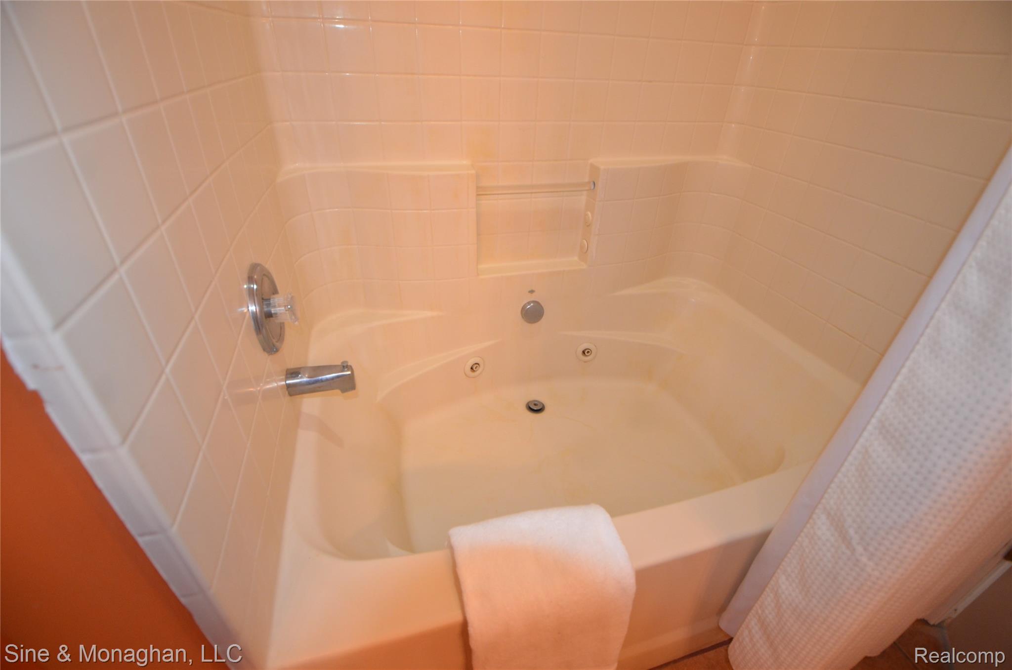 76152 Burman Road Richmond, MI 48062 - Photo 45 of 75 Bathroom featuring a combined bath / shower with jetted tub