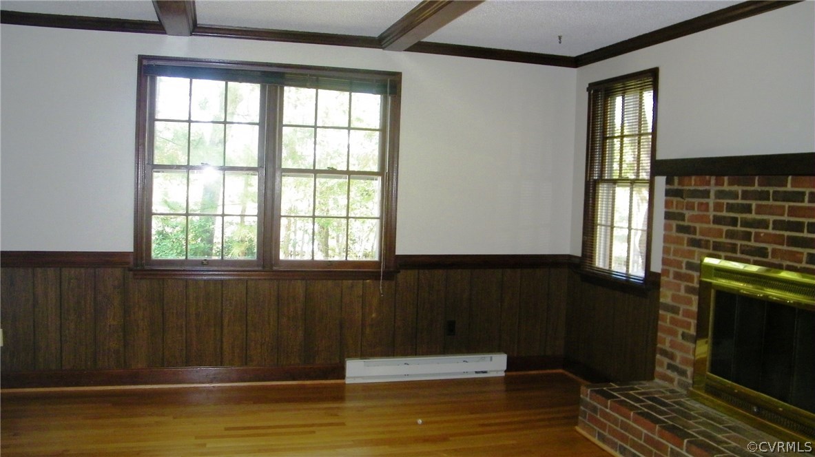 13401 Inge Road Chester, VA 23836 - Photo 13 of 24 a view of a fireplace and window in a room