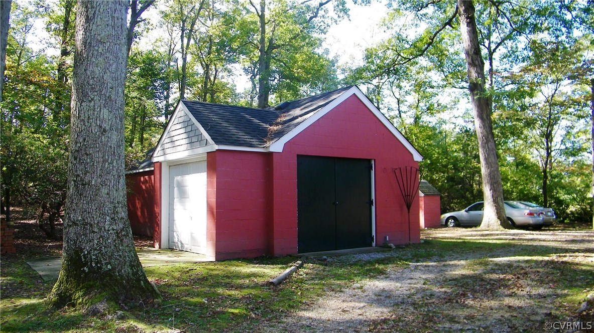 13401 Inge Road Chester, VA 23836 - Photo 20 of 24 a front view of a house with garden