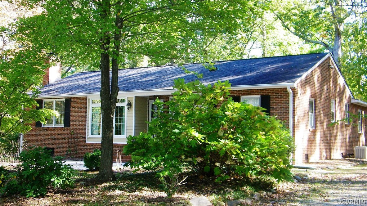 13401 Inge Road Chester, VA 23836 - Photo 22 of 24 a view of a house with a tree