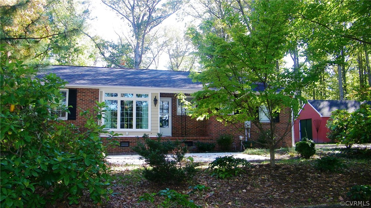 13401 Inge Road Chester, VA 23836 - Photo 23 of 24 a front view of a house with garden