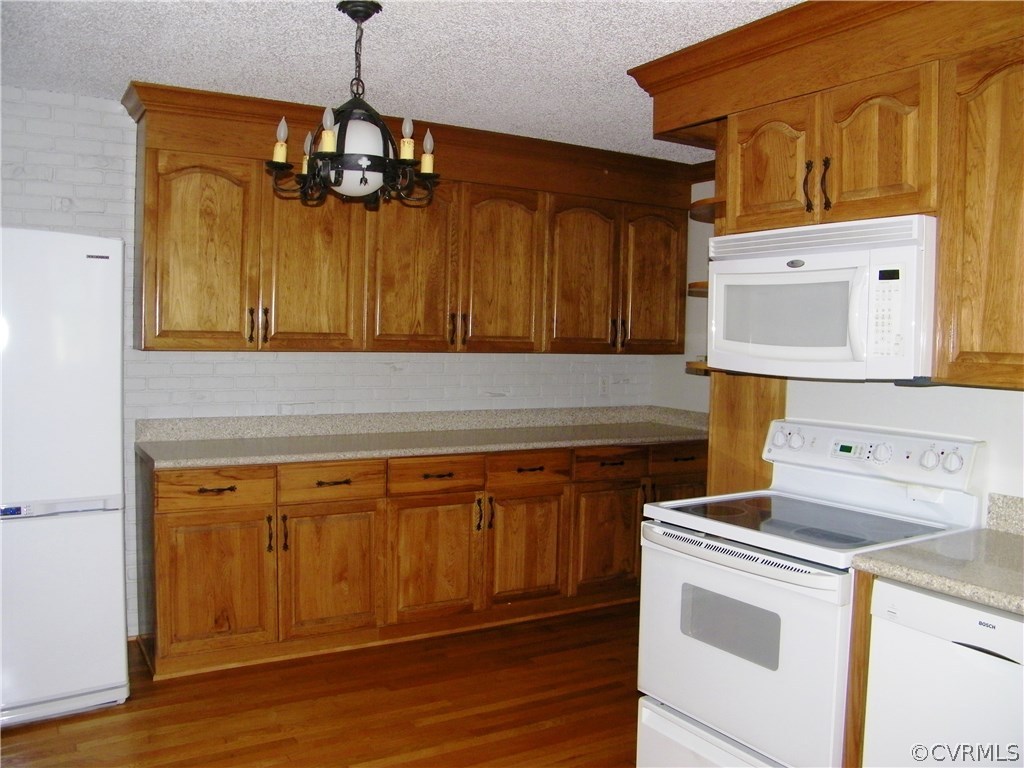 13401 Inge Road Chester, VA 23836 - Photo 6 of 24 a utility room with dryer and washer