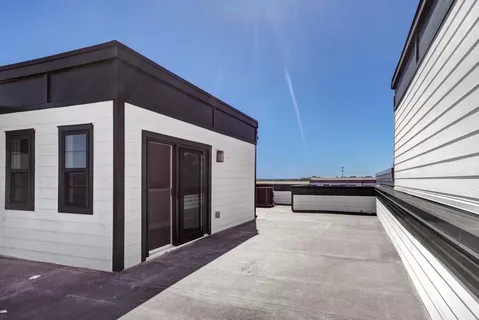 a front view of a house with stairs