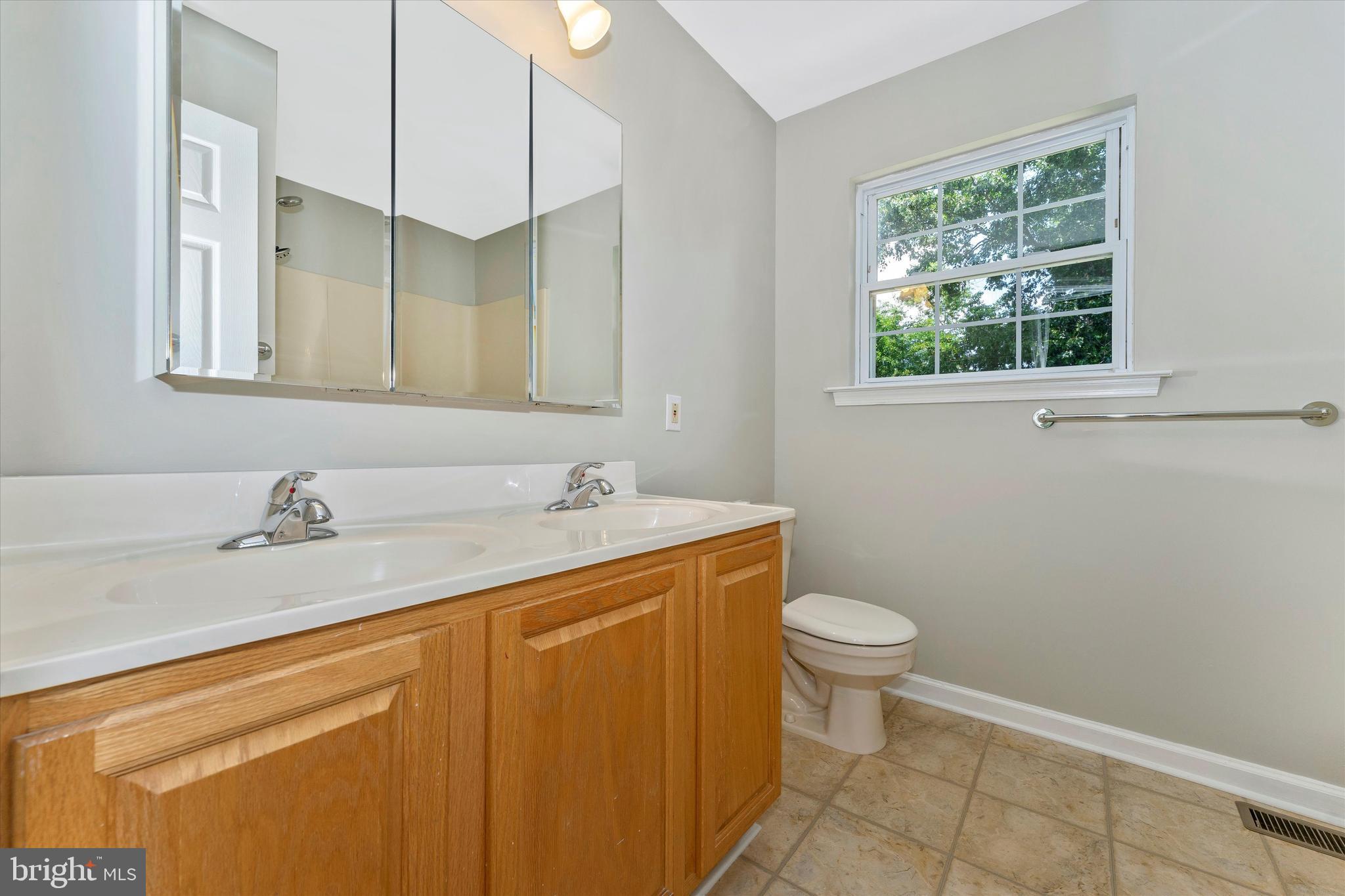 6385 Waterloo Road Elkridge, MD 21075 - Photo 17 of 36 Master bath has with double vanity and jetted tub