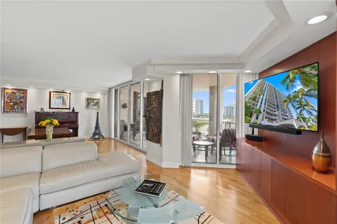a view of a glass door and a porch