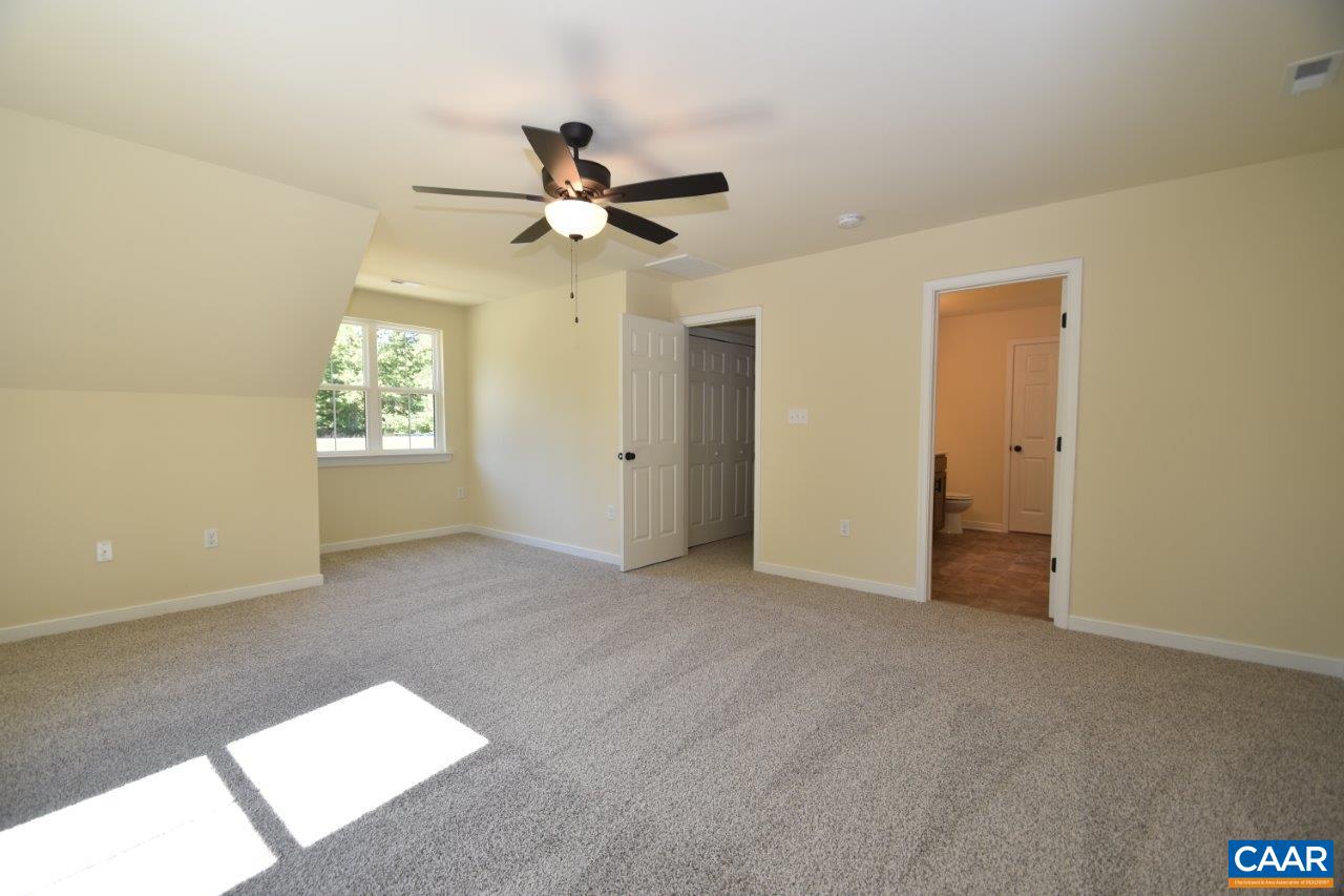 142 Jordan Store Road, Unit LOT 27 Kents Store, VA 23084 - Photo 12 of 13 an empty room with windows and fan