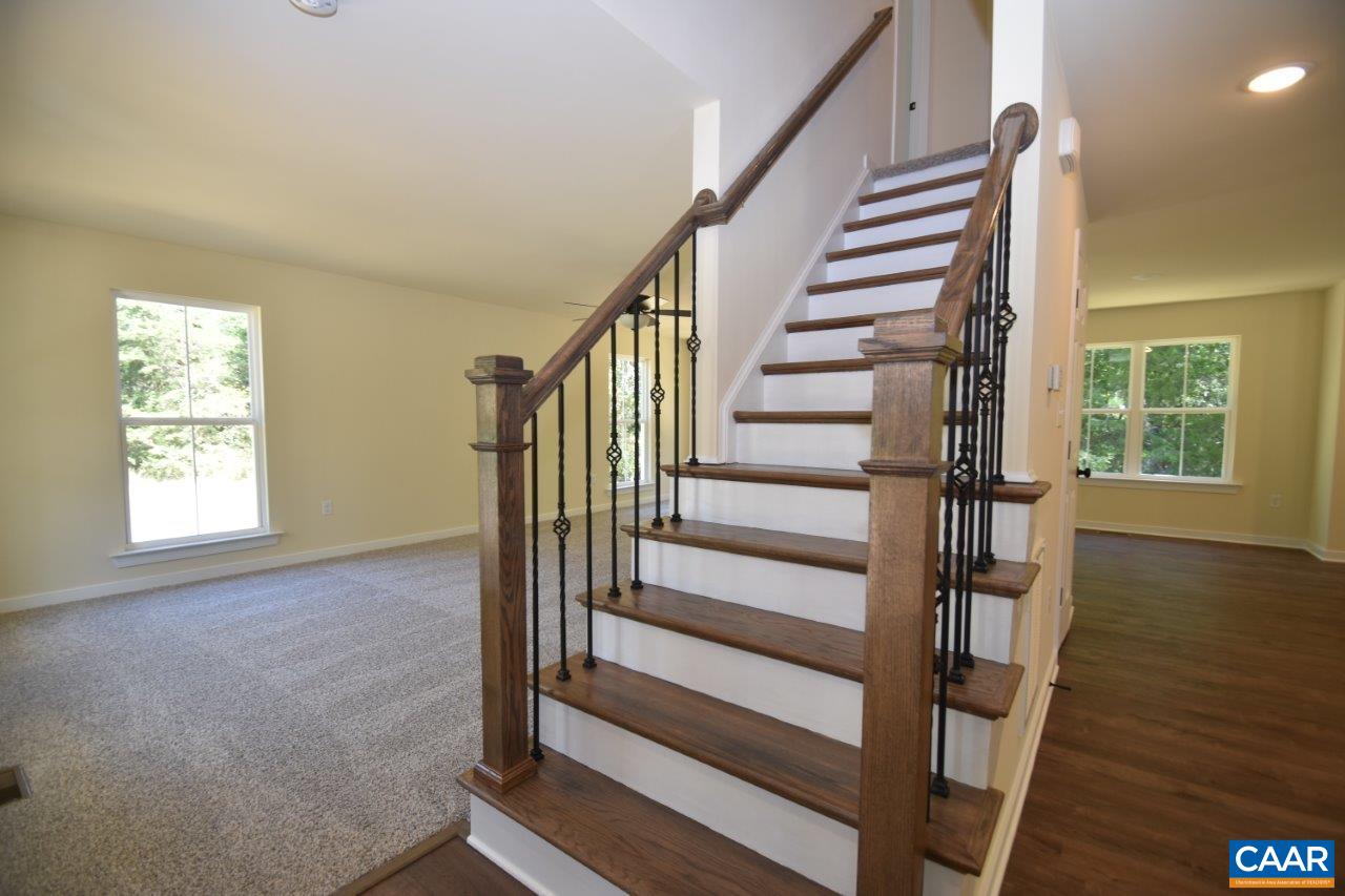 142 Jordan Store Road, Unit LOT 27 Kents Store, VA 23084 - Photo 5 of 13 a view of staircase with wooden floor and a window