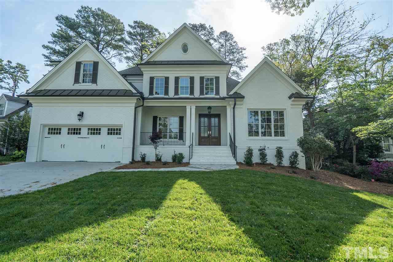 1508 Duplin Road Raleigh, NC 27607 - Photo 1 of 25 front view of a house with a yard