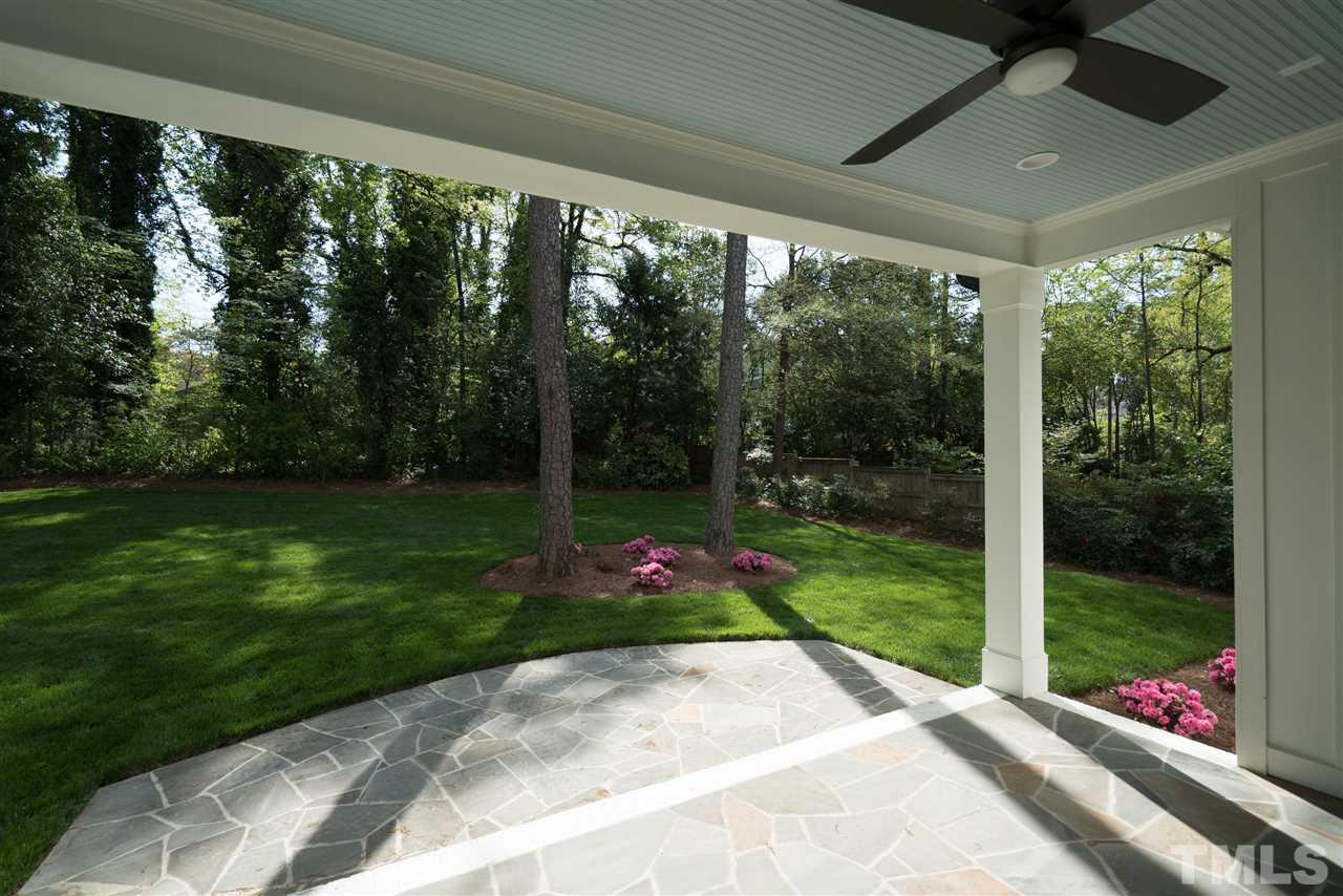 1508 Duplin Road Raleigh, NC 27607 - Photo 11 of 25 a front view of a house with garden