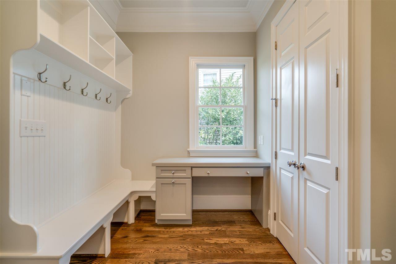 1508 Duplin Road Raleigh, NC 27607 - Photo 14 of 25 a view of an empty room with a fireplace