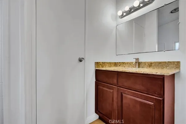 a sink with a mirror