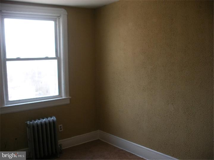 555 Millbank Road Upper Darby, PA 19082 - Photo 9 of 14 a small space with a window
