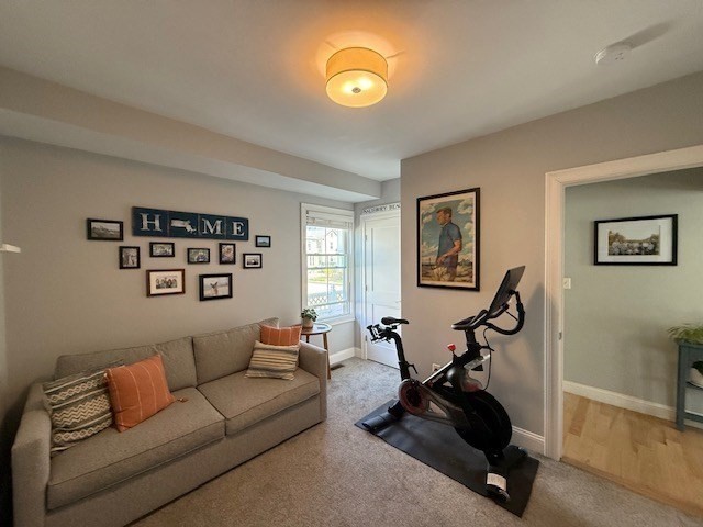 4 Cushing Street, Unit A Amesbury, MA 01913 - Photo 11 of 19 a living room with furniture and a window