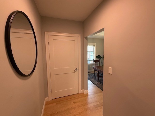 4 Cushing Street, Unit A Amesbury, MA 01913 - Photo 16 of 19 wooden floor in a kitchen