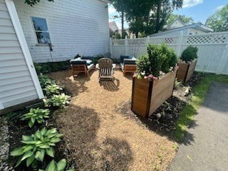 4 Cushing Street, Unit A Amesbury, MA 01913 - Photo 19 of 19 a view of a backyard with sitting area