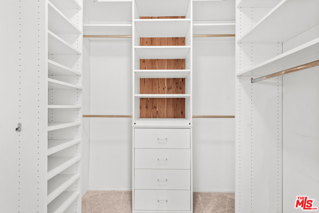4736 Park Encino Lane, Unit 215 Encino, CA 91436 - Photo 20 of 37 a view of an empty walk in closet