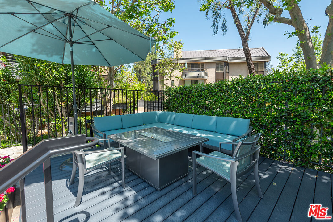 4736 Park Encino Lane, Unit 215 Encino, CA 91436 - Photo 29 of 37 a view of a roof deck with furniture