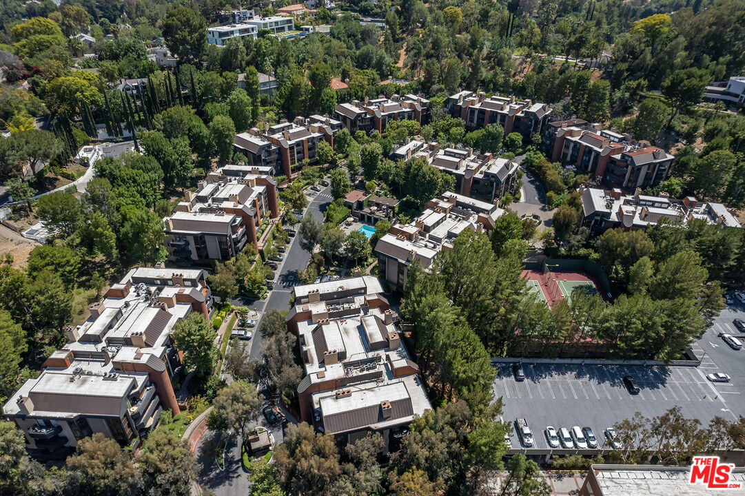 4736 Park Encino Lane, Unit 215 Encino, CA 91436 - Photo 35 of 37 an aerial view of residential house with outdoor space and parking