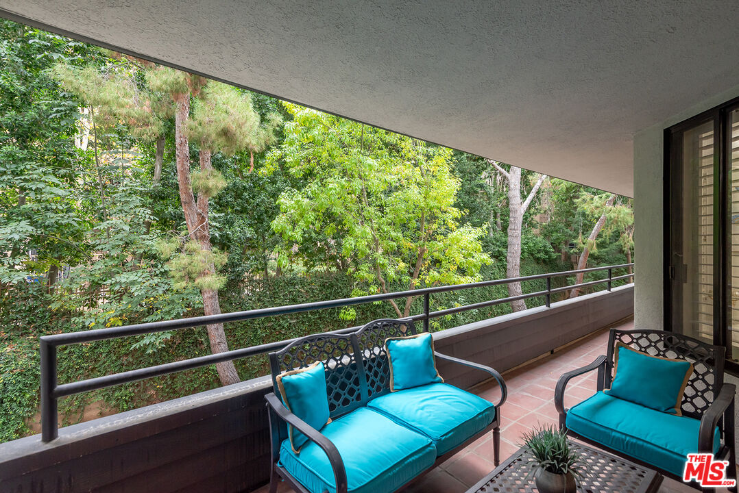 4736 Park Encino Lane, Unit 215 Encino, CA 91436 - Photo 36 of 37 a view of a two chair in the balcony