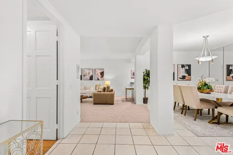 a view of a livingroom with furniture and toys