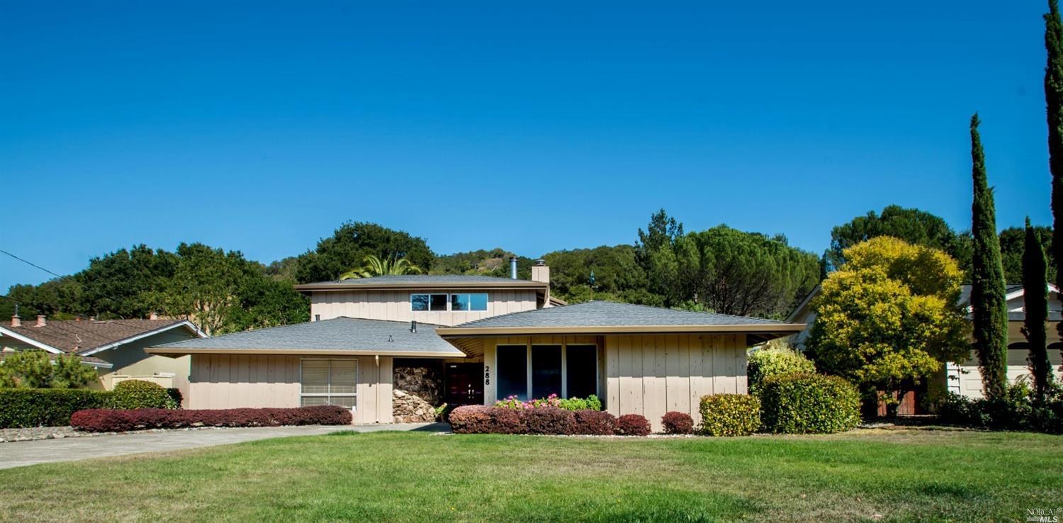 288 Ellen Drive San Rafael, CA 94903 - Photo 1 of 1 a front view of house with yard and green space