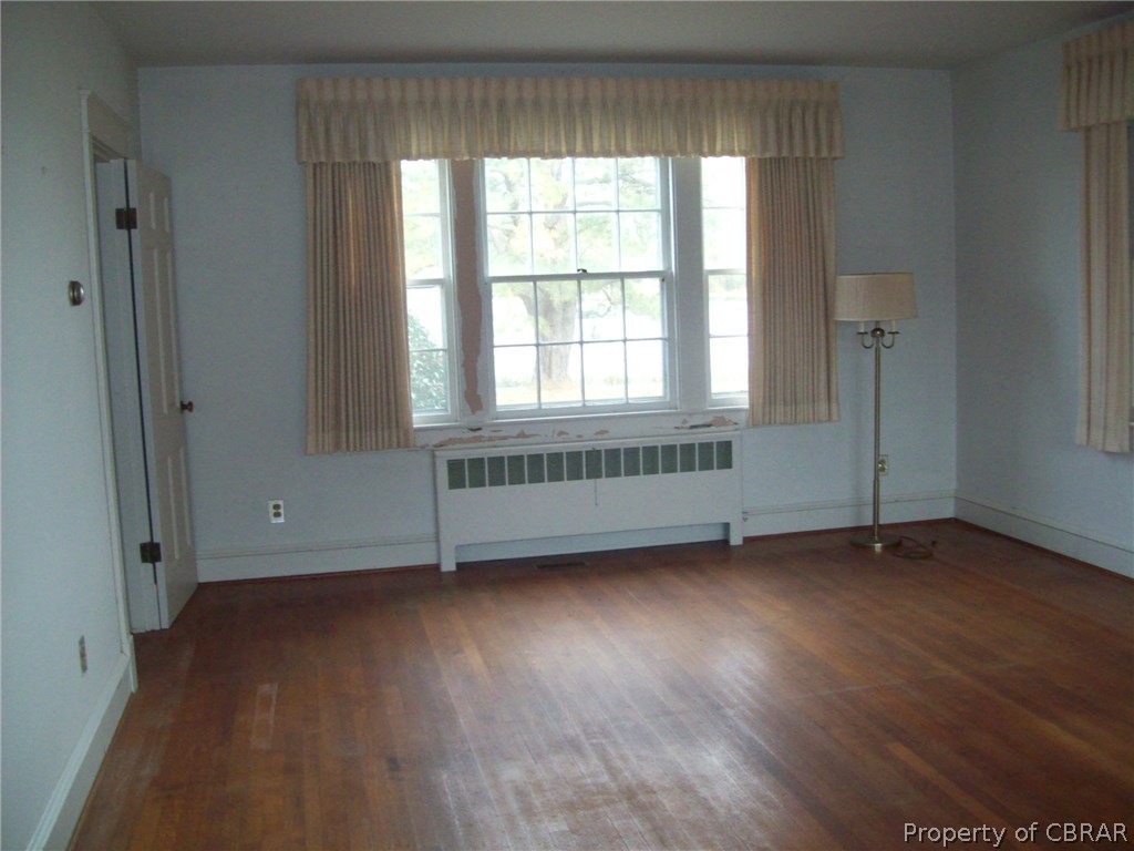 477 Rains Lane Cardinal, VA 23025 - Photo 15 of 30 Living room with views of water, beautiful oak floors