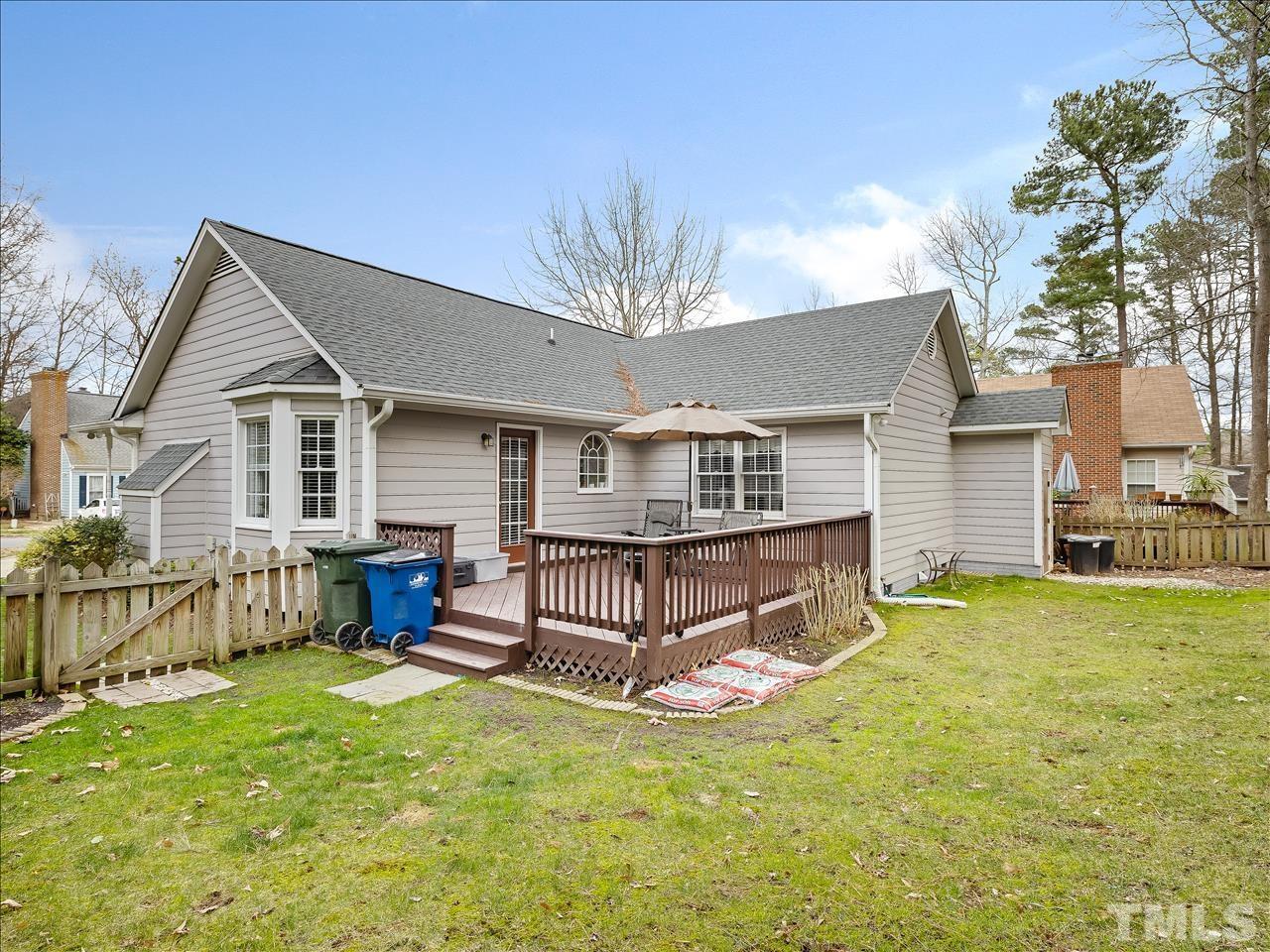 4408 Emmit Drive Raleigh, NC 27604 - Photo 1 of 38 a view of a house with a yard and sitting area
