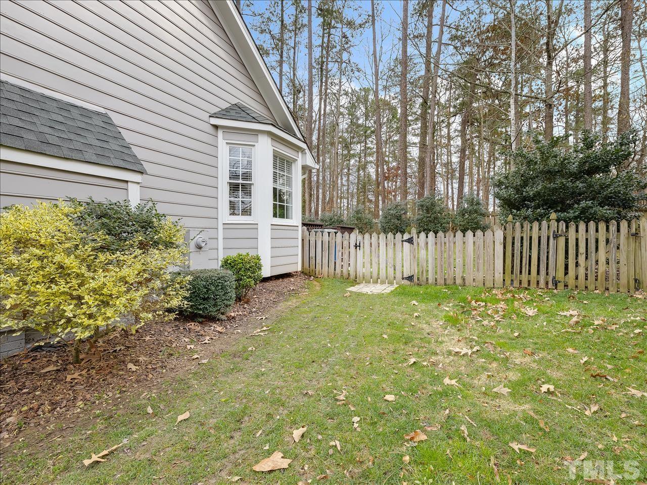 4408 Emmit Drive Raleigh, NC 27604 - Photo 13 of 38 a view of a house with a backyard