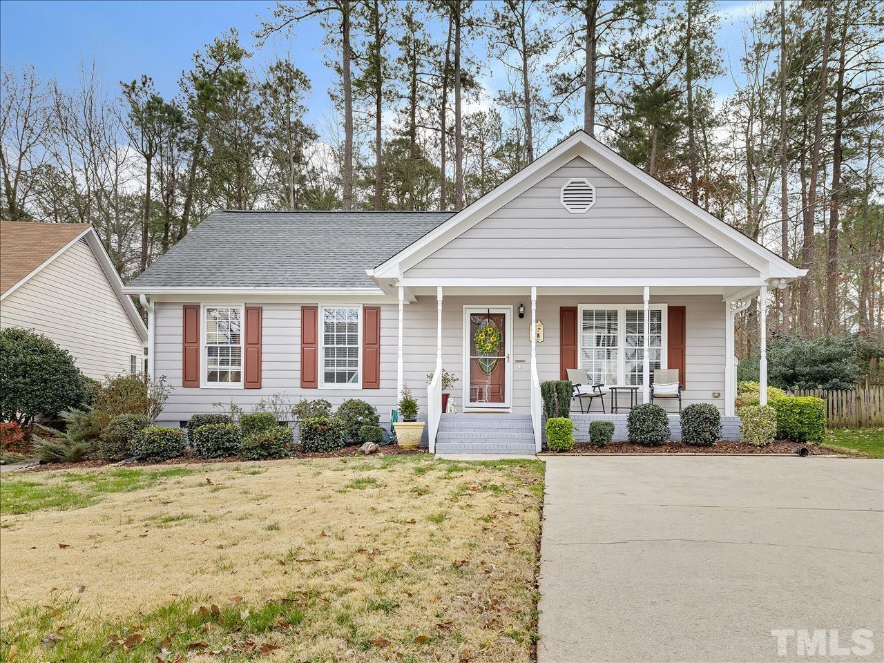 4408 Emmit Drive Raleigh, NC 27604 - Photo 16 of 38 a front view of a house with garden