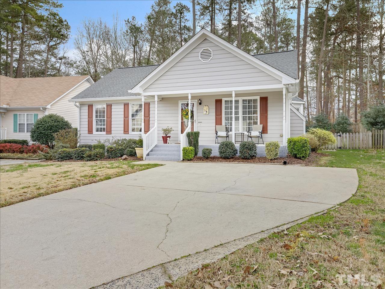 4408 Emmit Drive Raleigh, NC 27604 - Photo 18 of 38 front view of a house with a yard