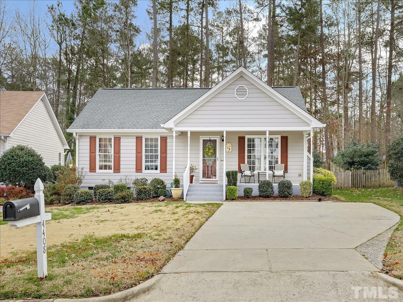 4408 Emmit Drive Raleigh, NC 27604 - Photo 19 of 38 a front view of a house with garden