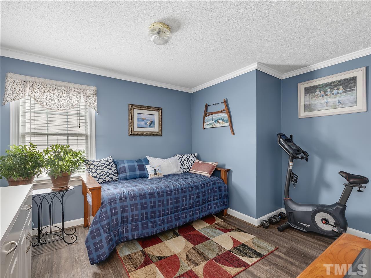 4408 Emmit Drive Raleigh, NC 27604 - Photo 7 of 38 a living room with furniture and wooden floor