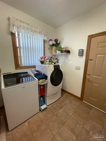 a living room with a couch and a fireplace