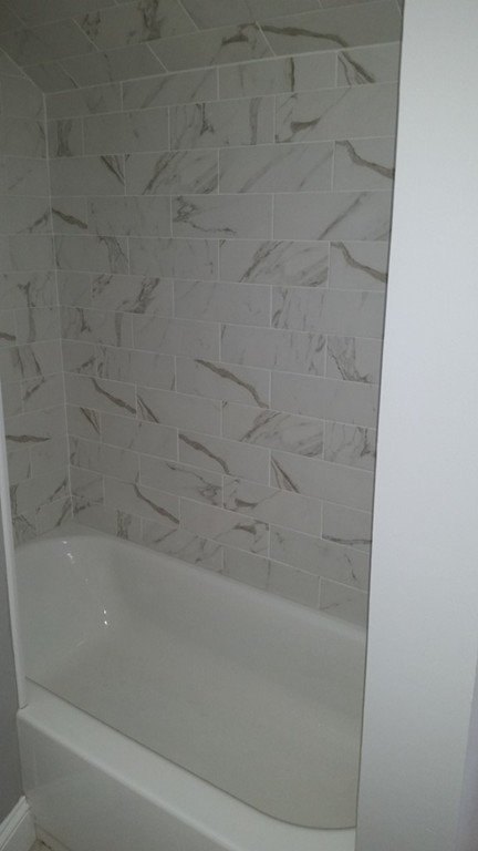 49 Drexel Street Springfield, MA 01104 - Photo 16 of 30 a bathroom with a bathtub