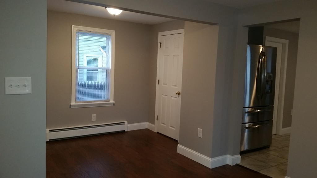 49 Drexel Street Springfield, MA 01104 - Photo 26 of 30 an empty room with windows and closet