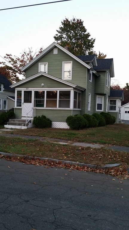 49 Drexel Street Springfield, MA 01104 - Photo 28 of 30 a front view of a house with a garden