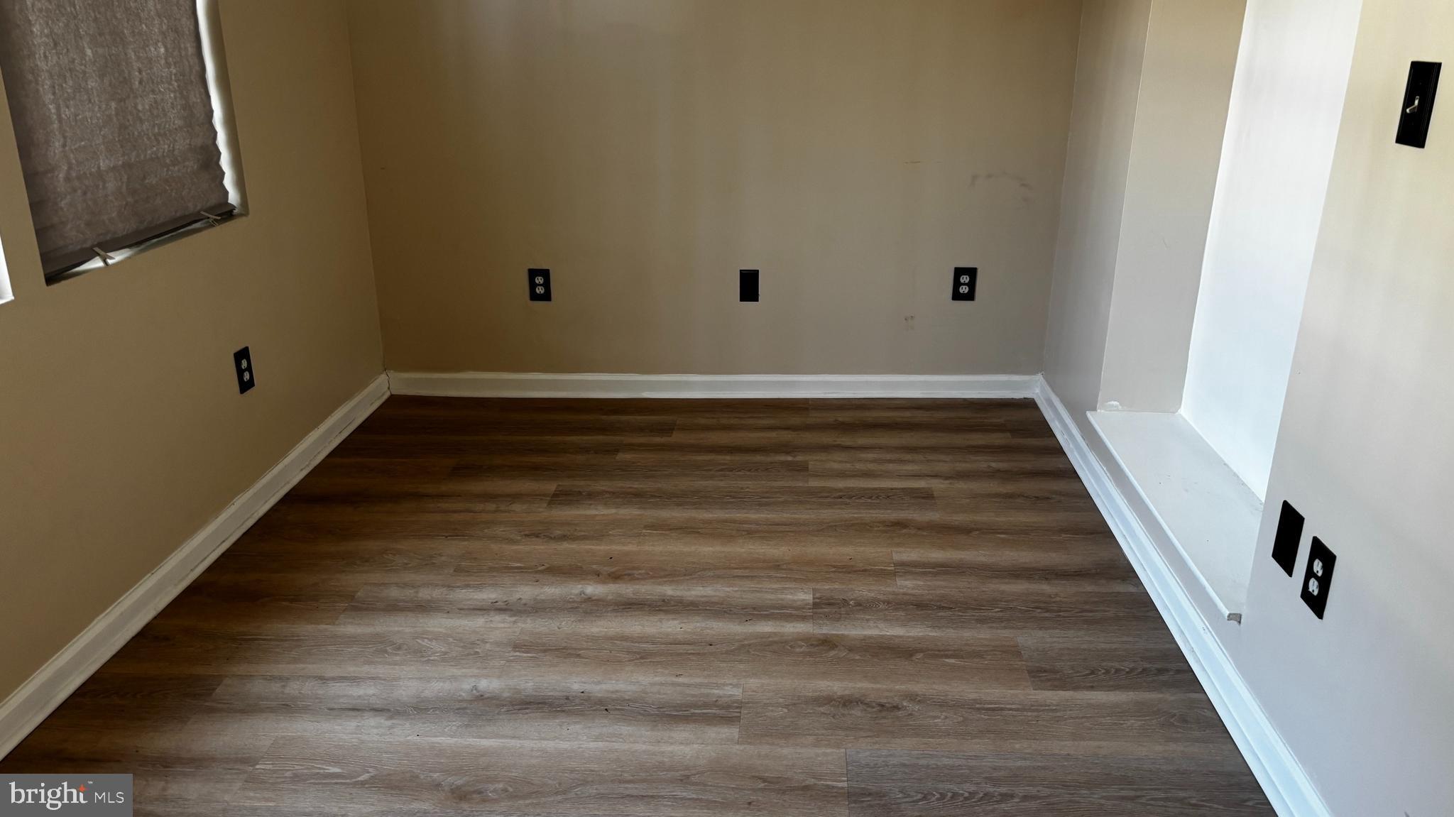 1240 18th Street Northeast, Unit 2 Washington, DC 20002 - Photo 8 of 11 a view of an empty room with wooden floor