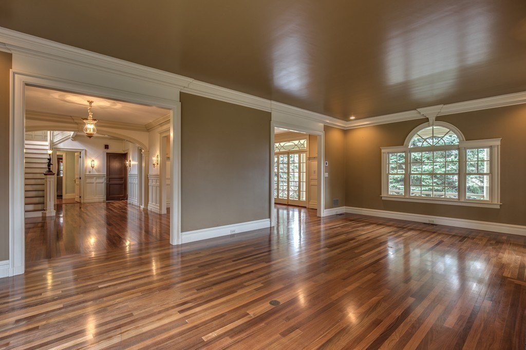 7 Percy Road Lexington, MA 02421 - Photo 12 of 29 wooden floor in an empty room with a window