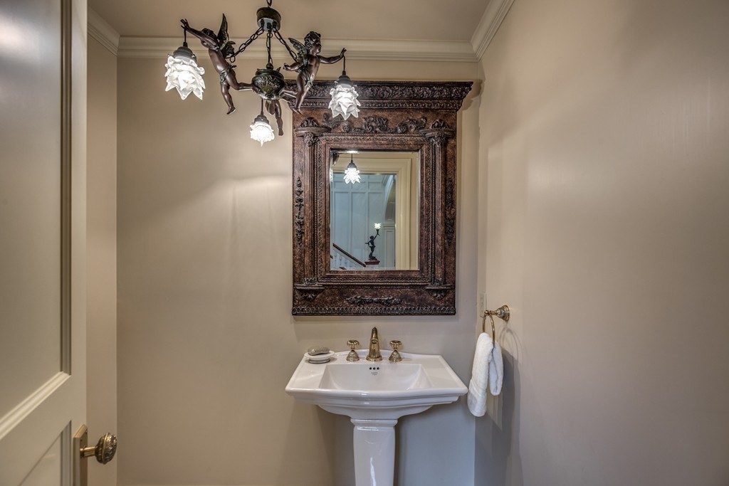 7 Percy Road Lexington, MA 02421 - Photo 13 of 29 a bathroom with a sink and a mirror